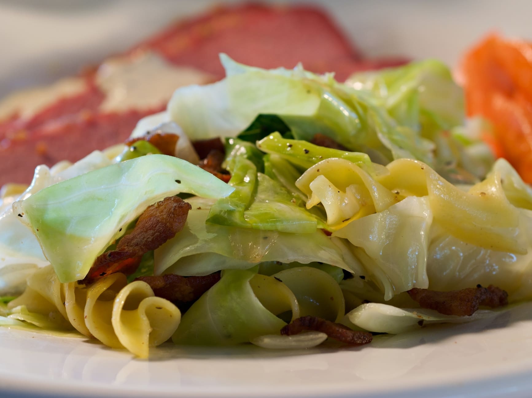 The total Irish comfort food! Smoky bacon, the crunch of green cabbage, and tender noodles make this dish completely mouthwatering and craveable.