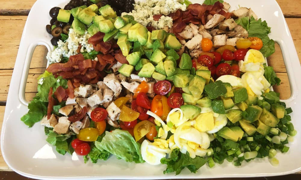 Chef Cari's Cobb Salad is a classic, but can be customizable as well, perfect for a casual get together. For vegetarians, simply remove the chicken and bacon, replace with black beans or chick peas. Delicious!