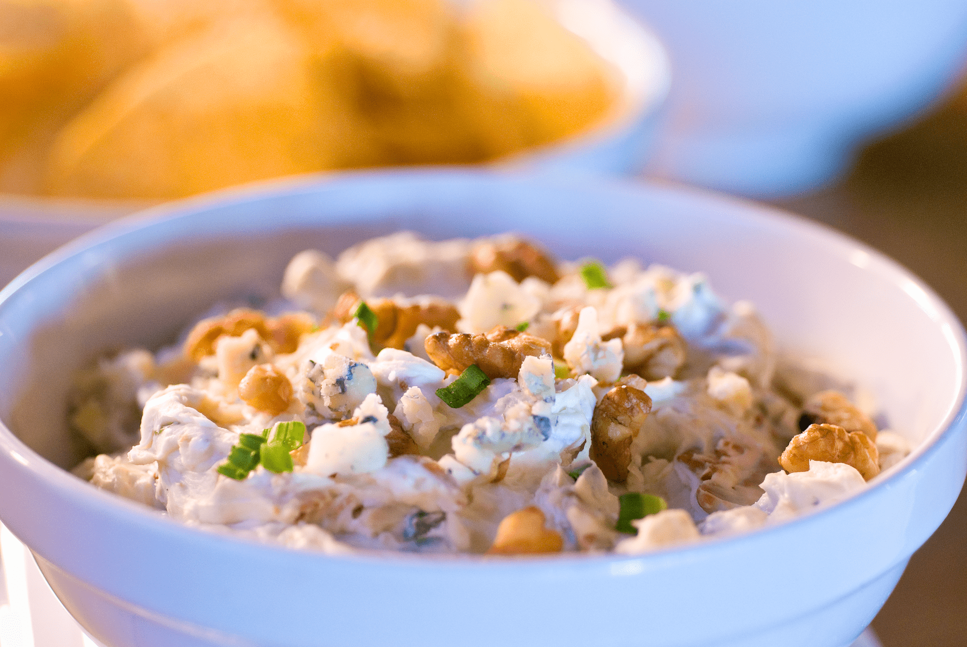 This macho dip requires a thick, sturdy chip! It is bursting with big bold flavors of smoky-sweet bacon, crumbled bits of tangy blue cheese and toasted walnuts. Serve it up warm with crunchy kettle-cooked potato chips.