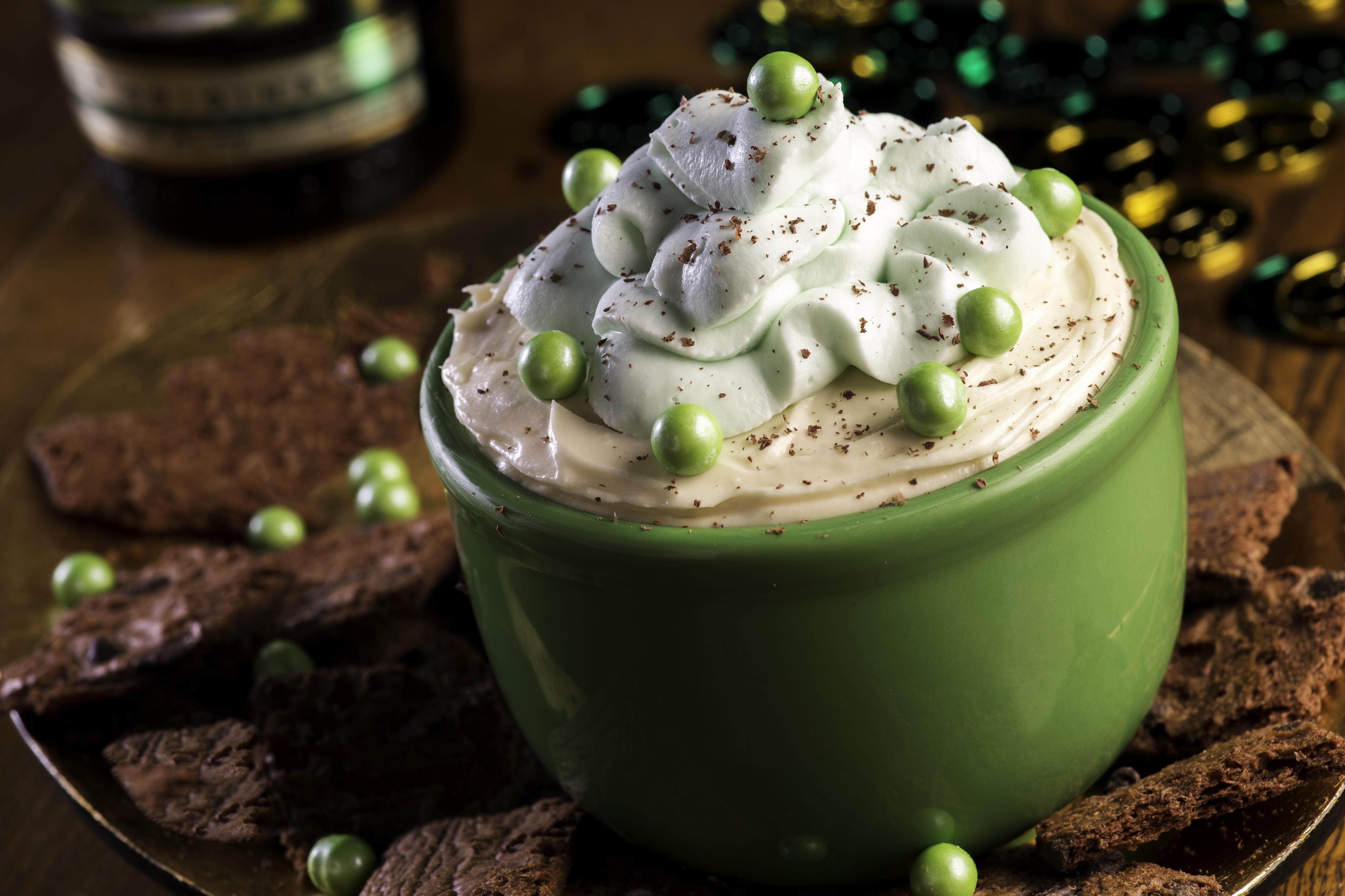 A delicious twist on your normal dessert dip, this boozy Irish Cream Dip with a homemade mint whipped cream is light, fluffy, and creamy in all the right ways.