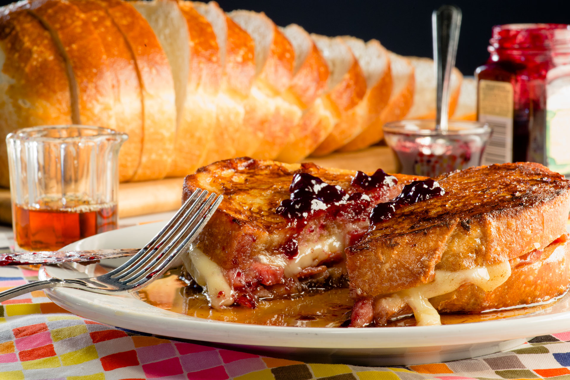 We paired smoky-sweet griddled country ham, gooey melted Fontina and creamy maple Dijon sauce together for our Monte Cristo sandwich and then drenched it in real maple syrup for the perfect brunch or late-night sandwich recipe. Because, after all, everyone needs a little bit of over-the-top indulgence once in a while! This is part of a series done with Sandwich America to feature some of our country’s great sandwiches!