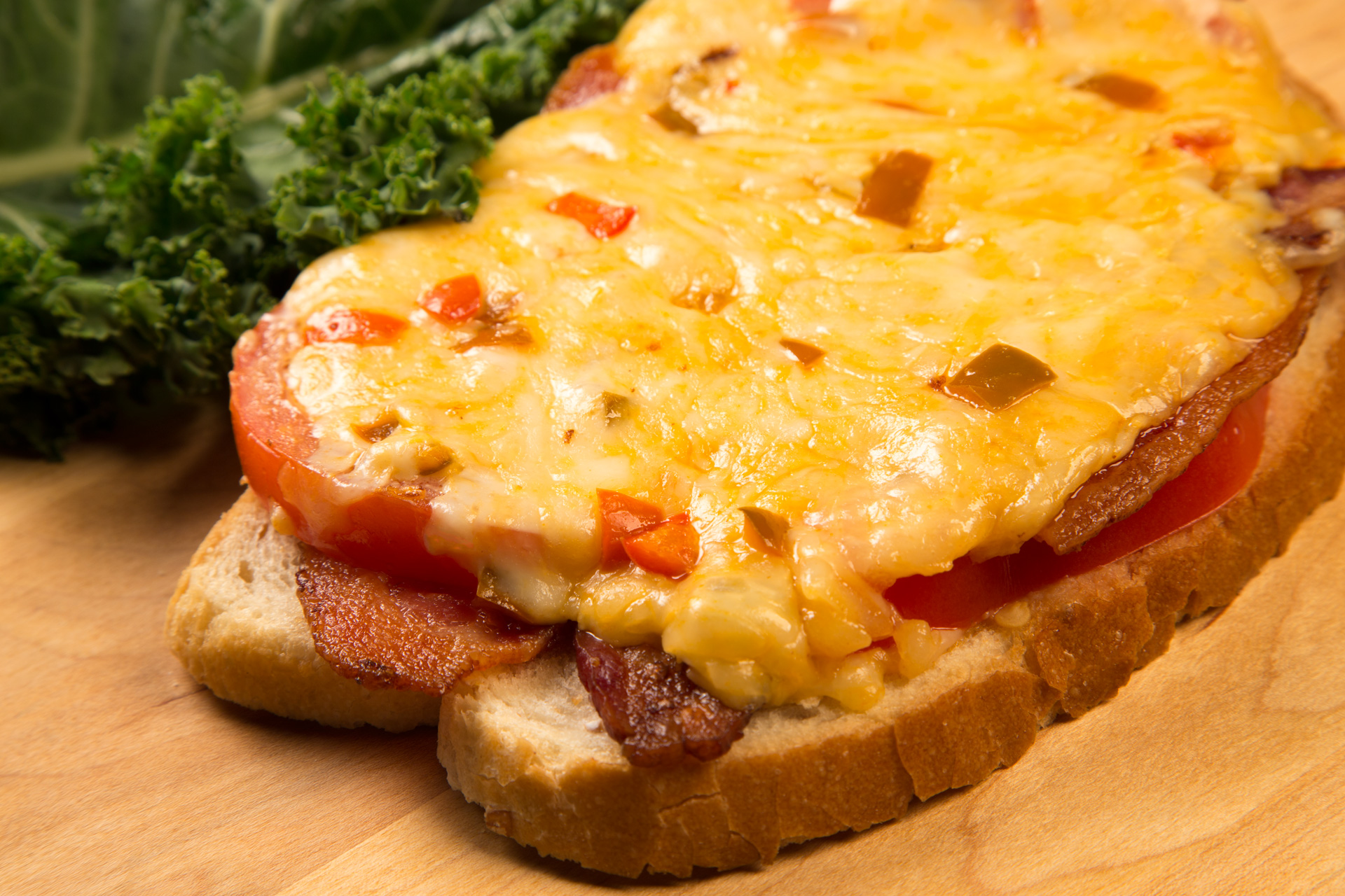 This Open Faced Spicy Grilled Cheese is melty goodness made easy with the help of Heavy Duty Mayonnaise and a few creative toppings.