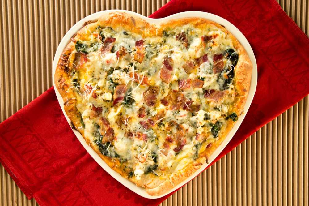 This brown butter lobster pizza is a perfect way to upgrade your typical pizza for a special occasion such as Valentine's Day.