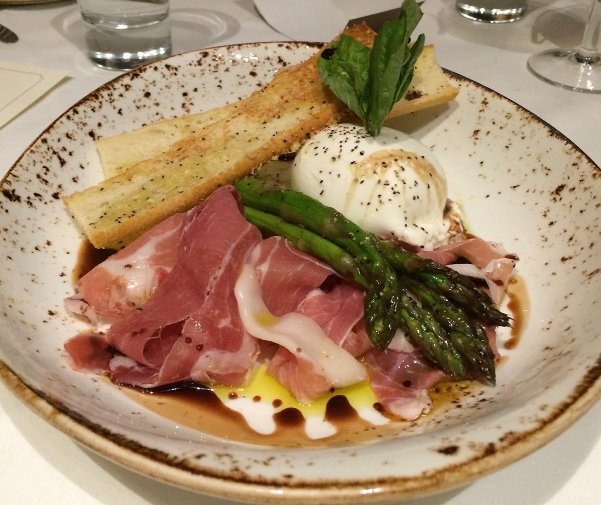 Burrata Prosciutto, one of the appetizer selections at Wollensky Grill
