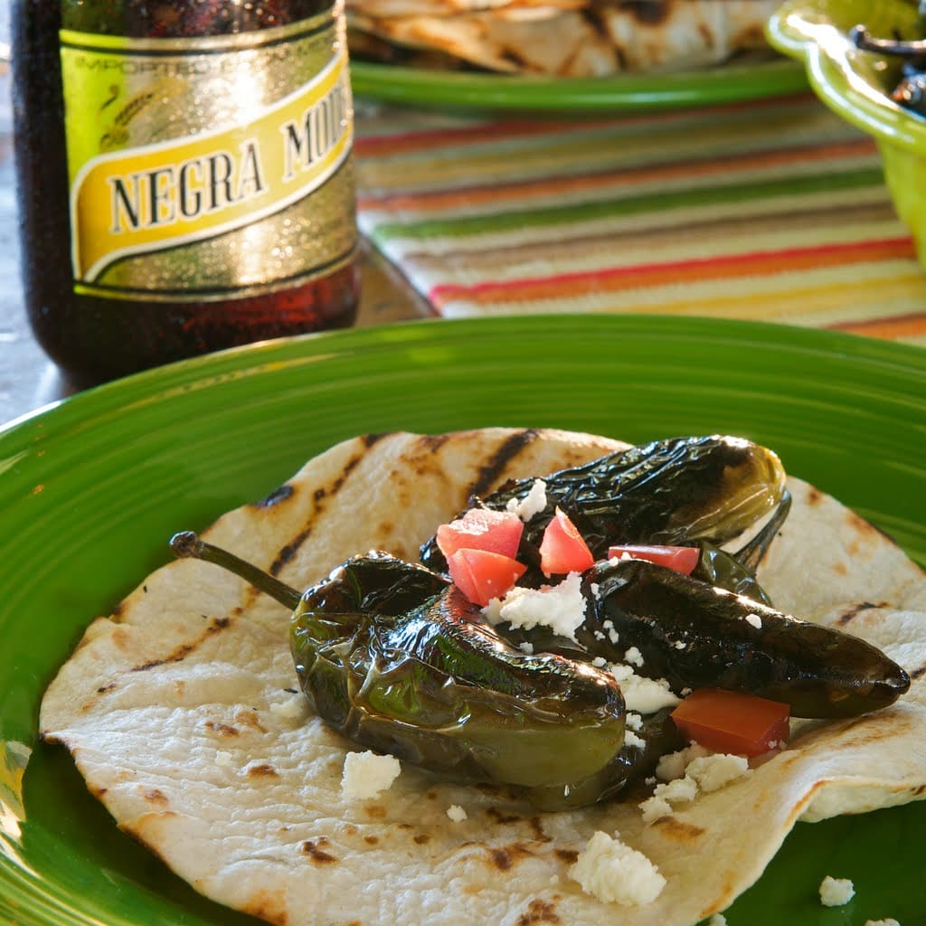 The term ‘toreados’ comes from the action of sautéing peppers until they brown and blister on all sides. Enjoy these with your favorite grilled item or in any taco!