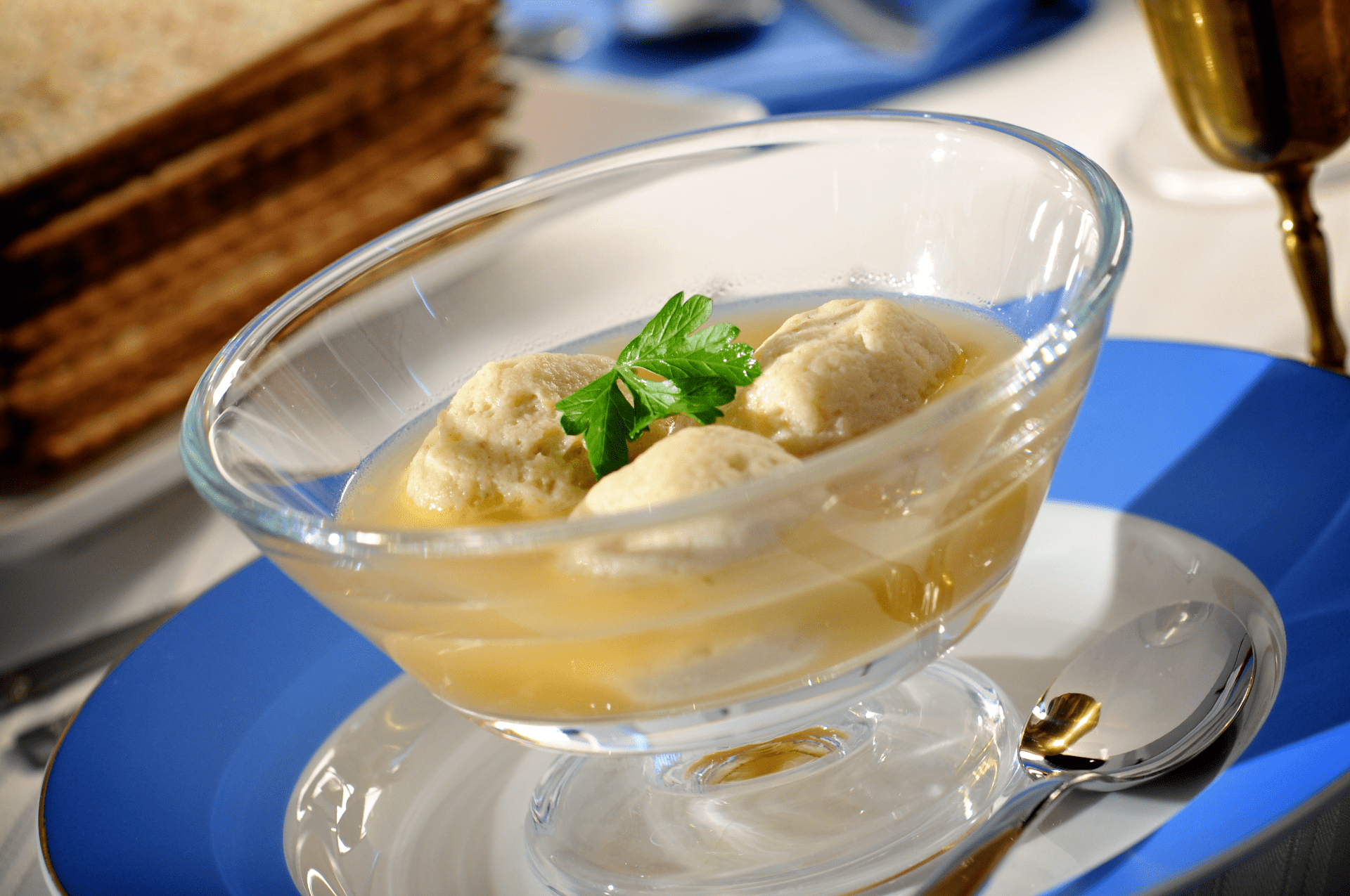 Matzoh Ball Soup is a classic favorite, with vegetables, thyme and clove—subtle, yet complex, flavors in a savory delight.