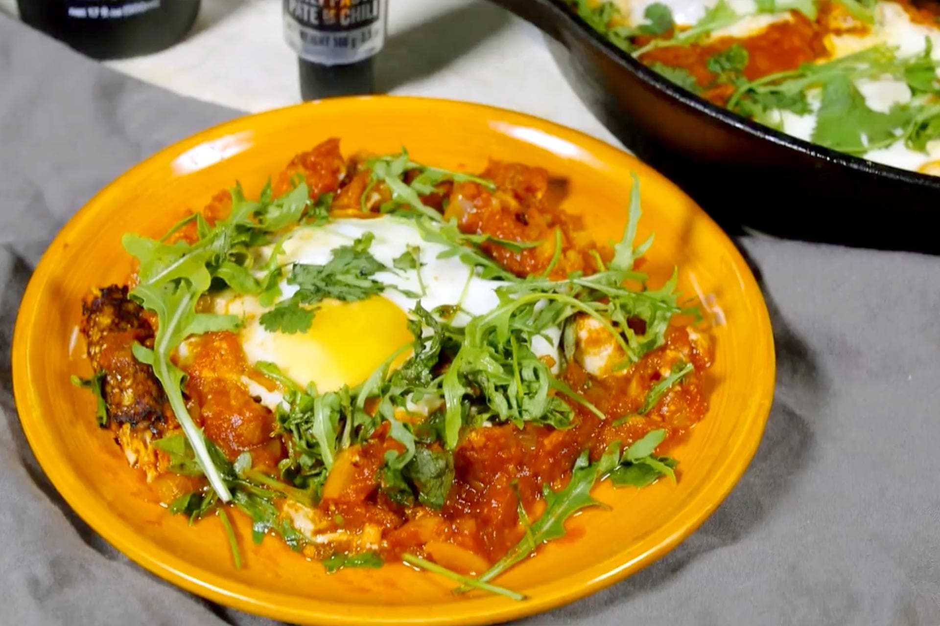 A delicious Mediterranean egg dish that will satisfy your appetite with an exotic blend of spices in a rich sauce enveloped by fried eggs, called Shakshuka!