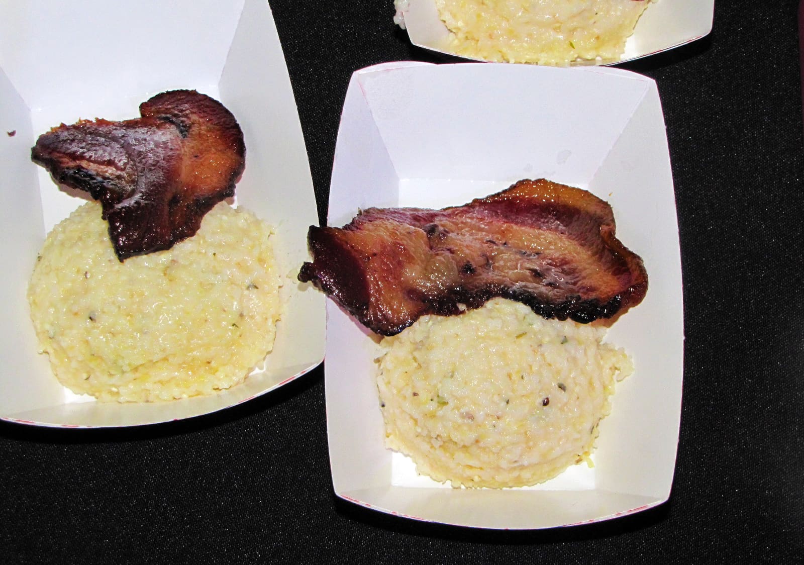 photo from the Baby Got Brunch event of jowl bacon with grits.
