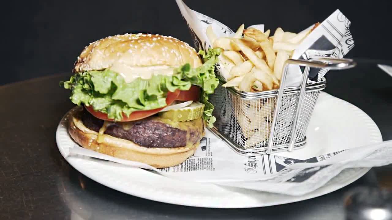 photo of a hamburger and fries from the famous chicago restaurant Miss Ricky's