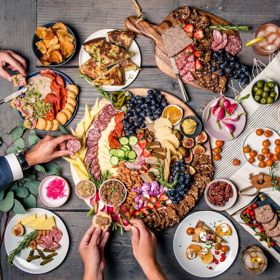 Charcuterie is a selection of cold-cooked meats, often served with pâté and confit or other spreads. A charcuterie tray is a perfect addition to your holiday celebrations, but it can seem intimidating, when in fact, it's really not. You're curating your favorites and assembling onto a platter, or serving dish, in an artful way. Perfect for letting your creative side show.