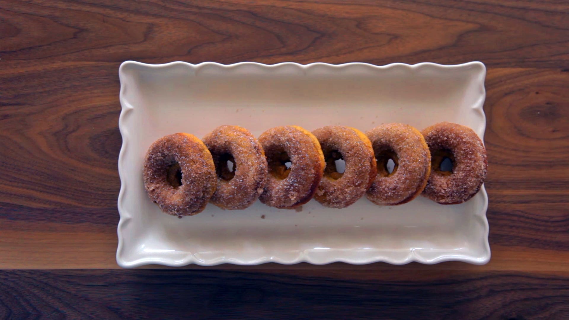 These Pumpkin Spice Donuts are incredibly simple and so delicious, even for those who don't consider themselves the best 'bakers'! These donuts are also a healthier alternative than those made with a standard cake mix. Baking the donuts, instead of frying them, creates less mess. This is especially important if you're cooking up these sweet treats with your kids and family.