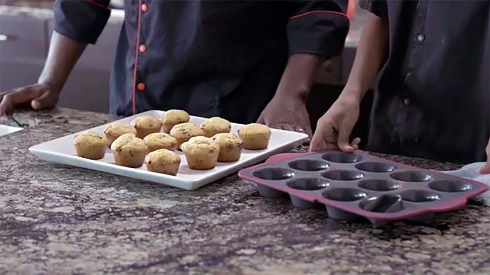 From Chef Ace Champion's series, Cooking with Kids, these Double Chocolate Chip Muffins are made by his teenage son Malcolm. Made with a combination of white and milk chocolate chips, these are easy enough for your own kids to get in the kitchen and make their own!