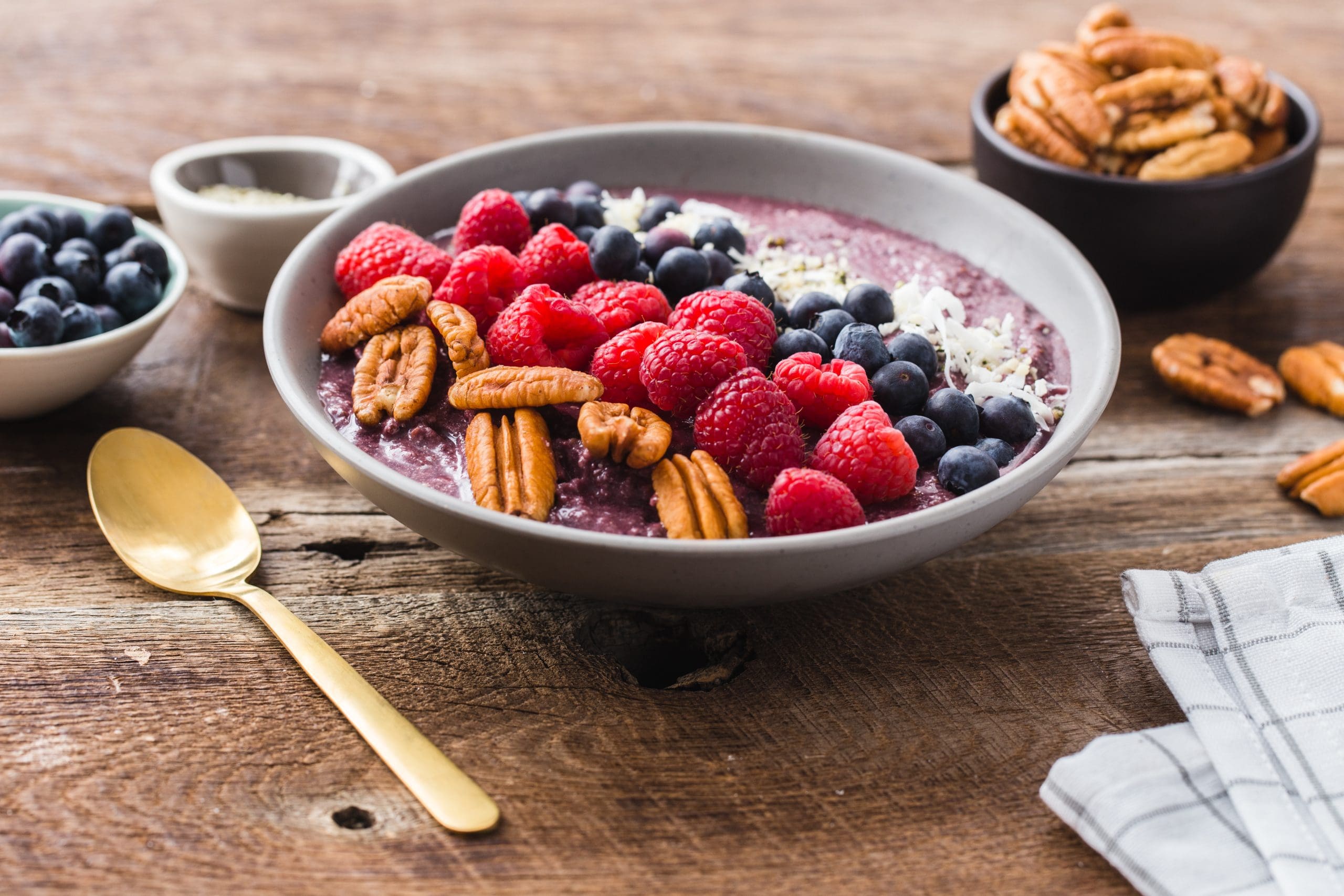 From pecans and chia seeds to coconut oil and berries, get your fill of superfoods with this colorful and nutritious acai berry pecan smoothie bowl.