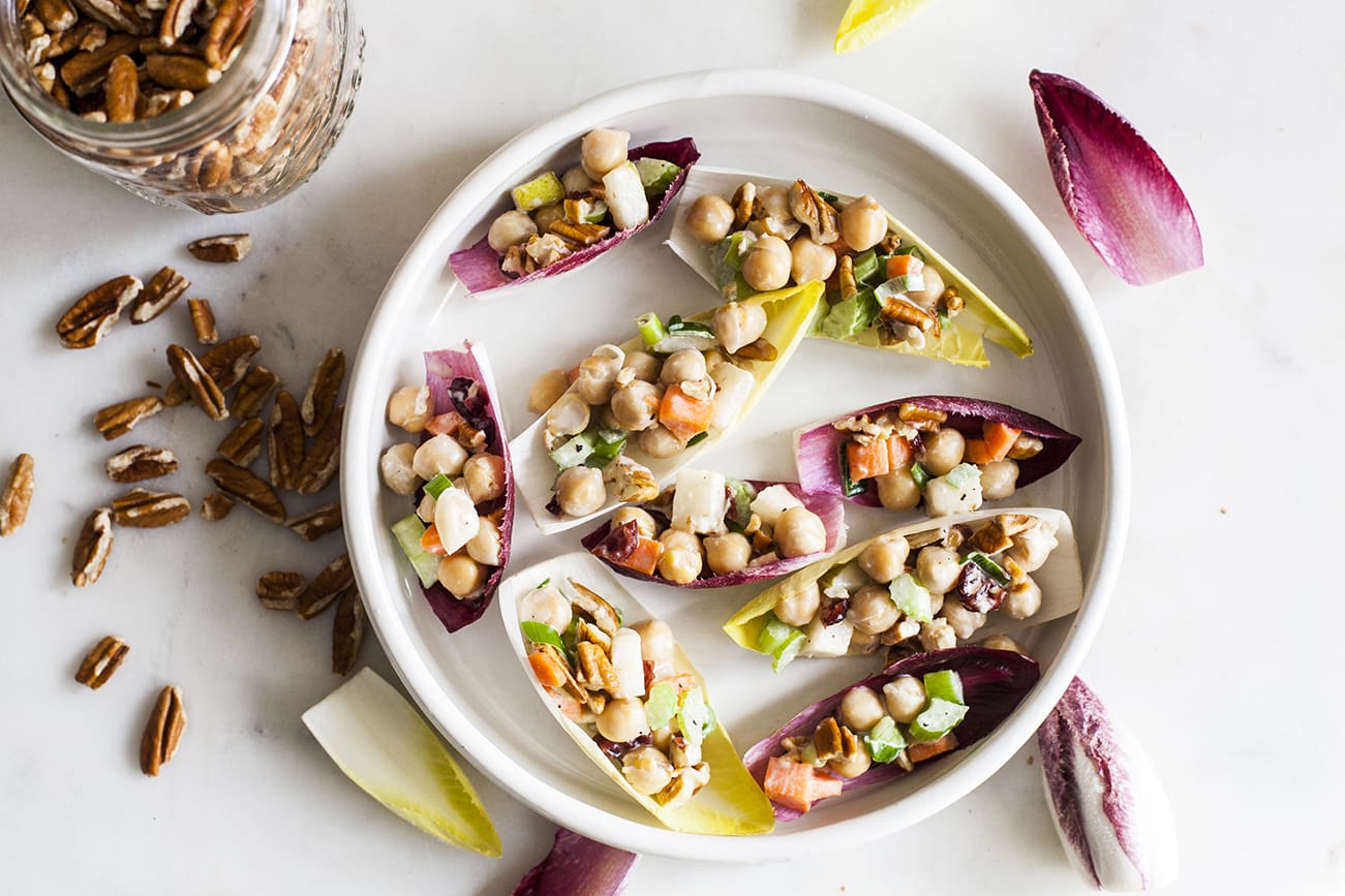 Pecans add a nutrient-dense crunch to this sweet and tangy salad. Serve it as a side dish or a main, or scoop it into endive lettuce wraps�for a finger food fit for entertaining.