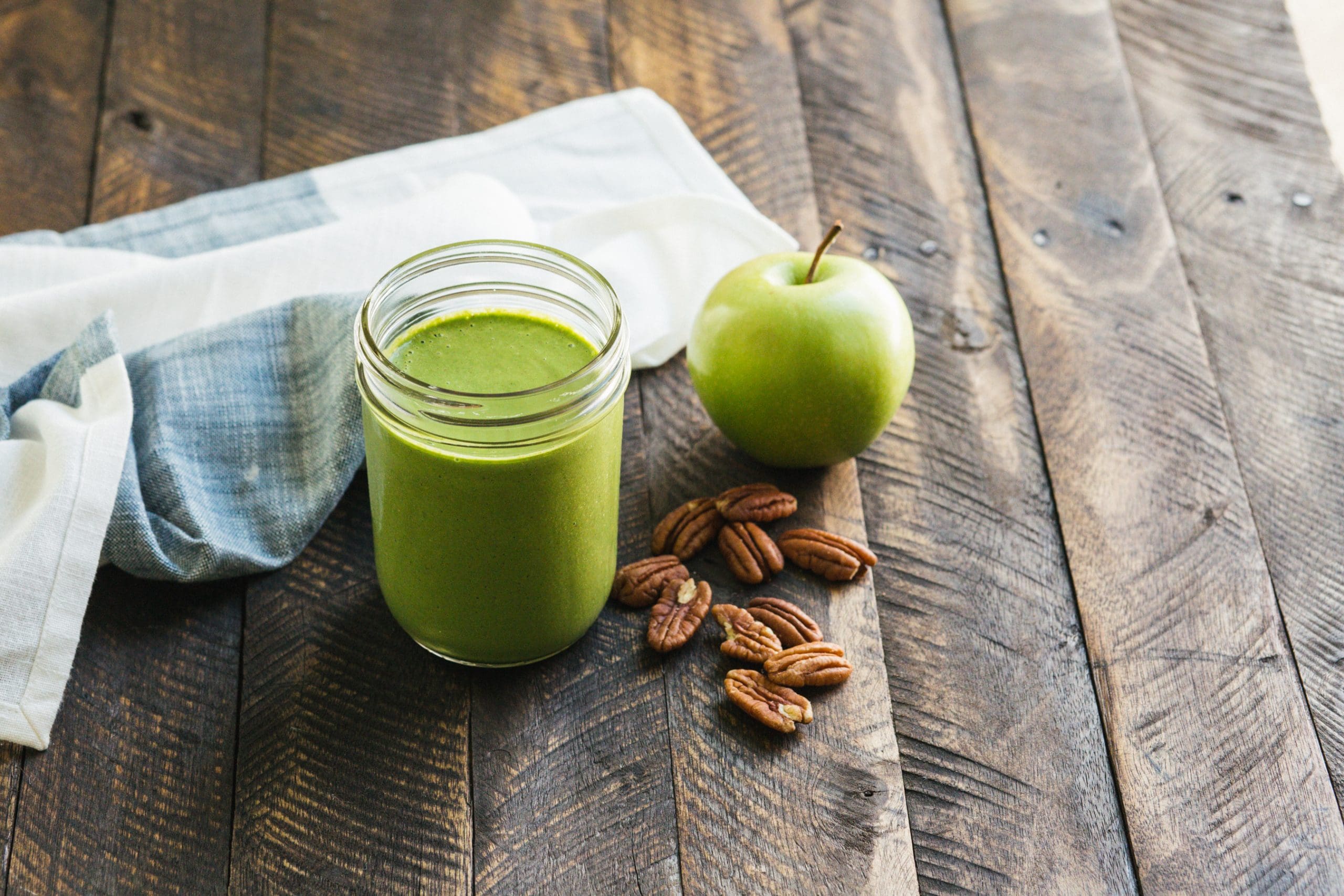 Homemade pecan milk and pecan pieces are the base for this invigorating Green Apple Pecan Smoothis that blends tangy green apple and spinach.