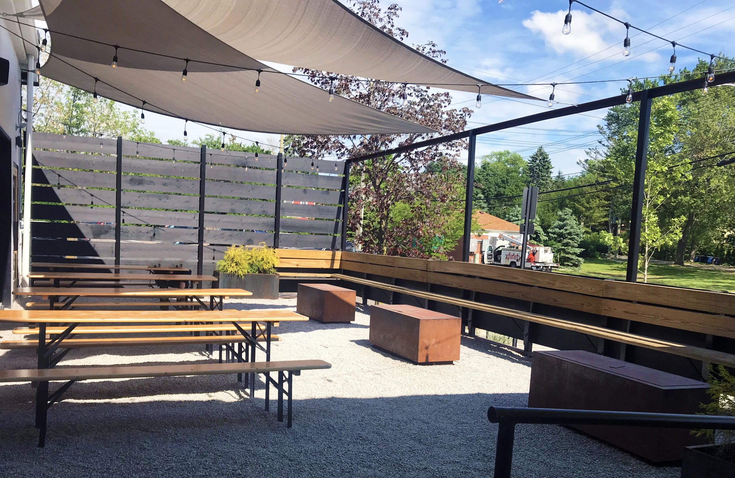 When you approach HOMES Brewery for the first time, the first thing you notice is the two large outdoor patios that sit in front. The building looks approachable and casual, yet vibrant and inviting with pops of lime green, orange and blue sprinkled across the front.