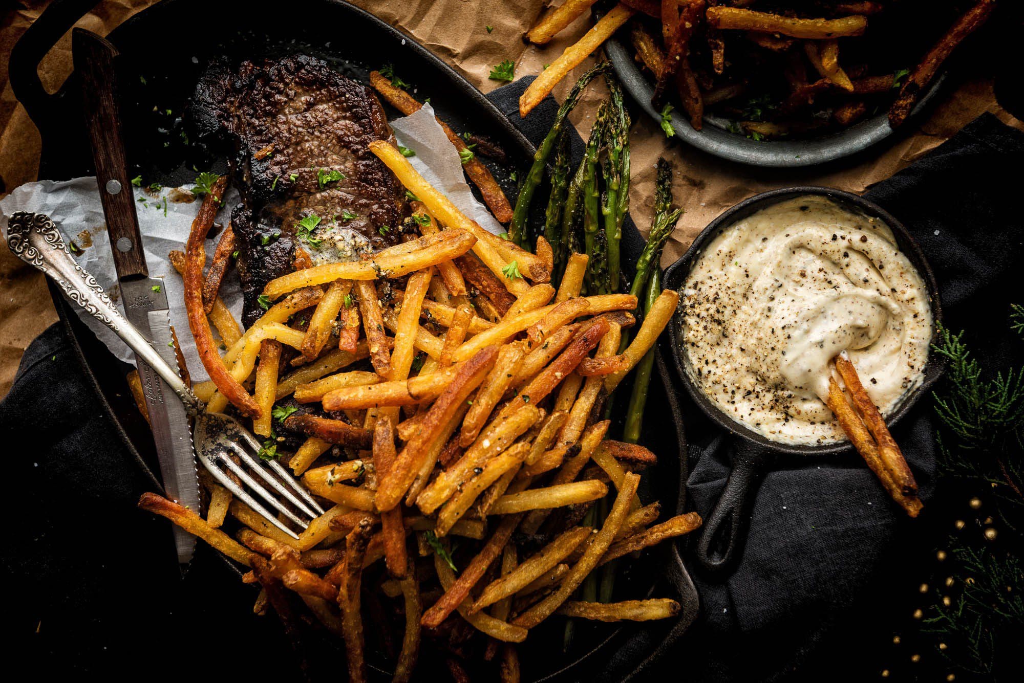 These bold matchstick fries are perfect for entertaining - an elegant spin on everyone�s favorite snackable side dish. Thinly pan baked, with a crisp duck fat crunch and an aromatic blend of roasted garlic and herbs has everyone rushing to nibble.