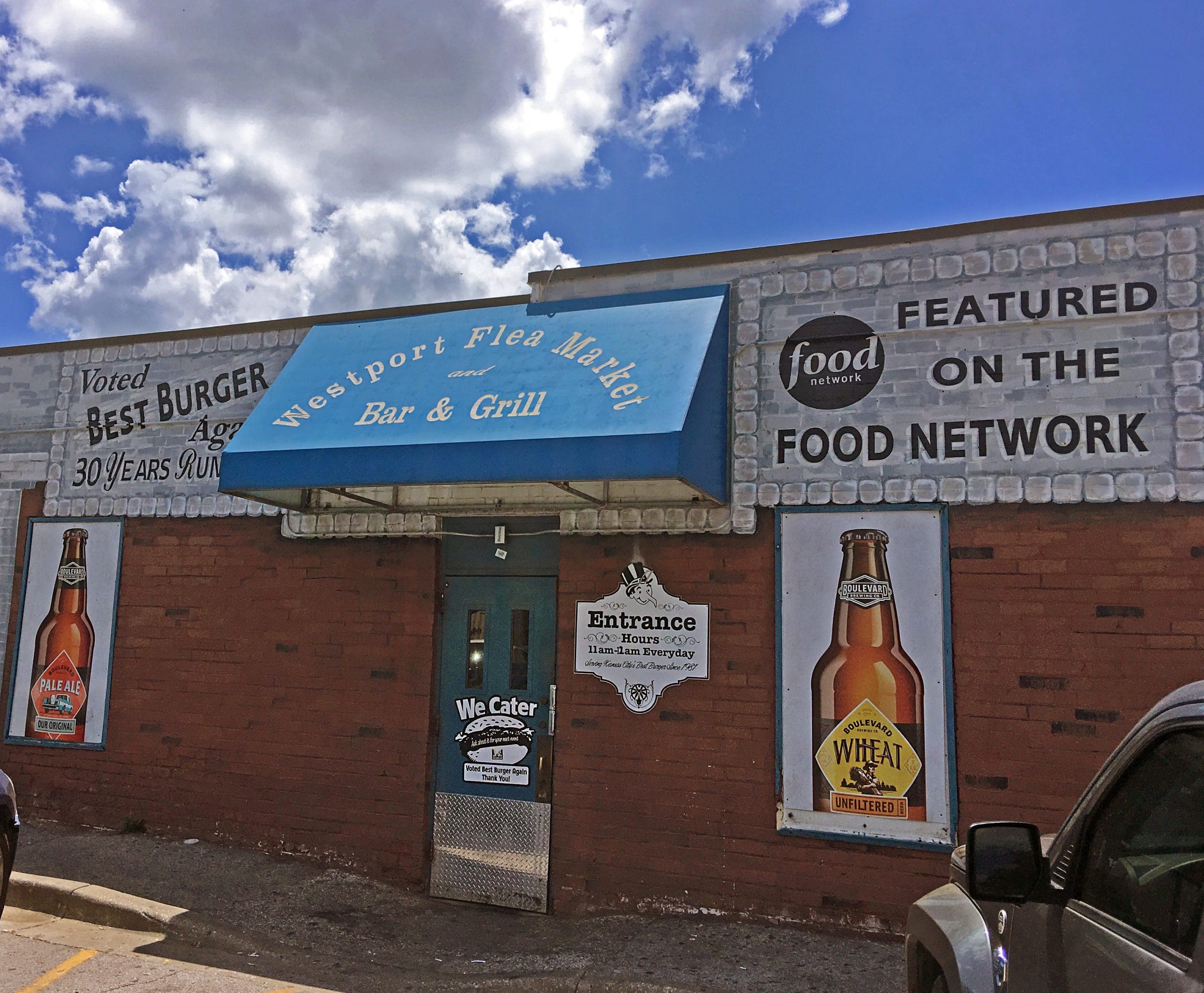 Just a short distance from Kansas City�s upscale Country Club Plaza, replete with fancy restaurants and caf�s, you can drop yourself smack dab into a renowned dive, called Westport Flea Market Bar and Grill.