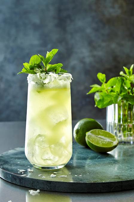 A refreshing summer cocktail made with Ciroc Summer Colada, lime juice, pineapple juice, coconut water and simple syrup.