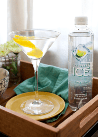 In a mixing glass, combine vodka and dry vermouth. Strain into a chilled martini glass and top with Lemon Lime Sparkling Ice. Garnish with a orange twist and serve.
