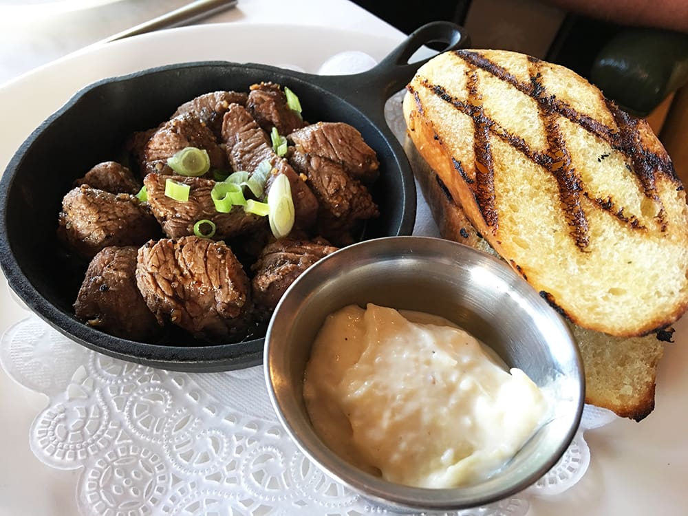 Start with the Steak Bites. They are described as pan seared tenderloin, with garlic aioli, grilled garlic toast—in other words, melt-in-your-mouth delicious. Seriously one of the best appetizers you’ll find anywhere.