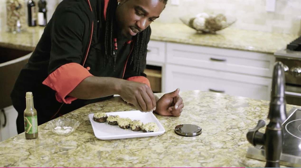 Chef Ace Champion adds salt and pepper to taste to his Peppercorn Cream Stuffed Mushroom Caps.