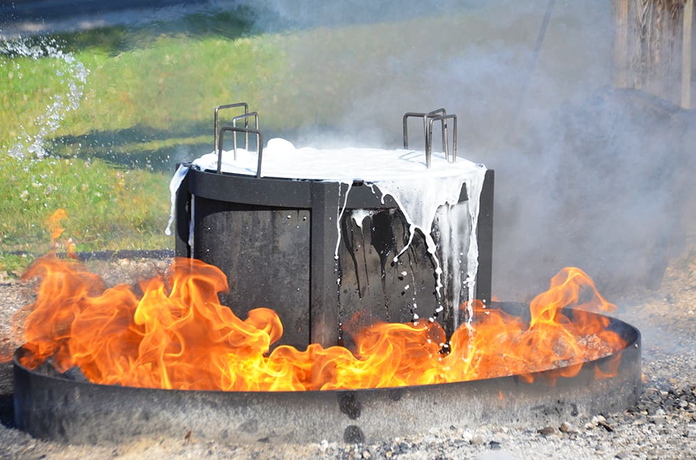 A fish boil is a feast that's hard to explain until you experience it. It’s a simple enough meal, unchanged since its beginnings in the late 1800s. Fish, potatoes, onions, salt, and water all go in a cauldron to be cooked over fire—which then gets a dousing of kerosene, the water boils over the top in a huge flash of smoke and fire, and the food is served.