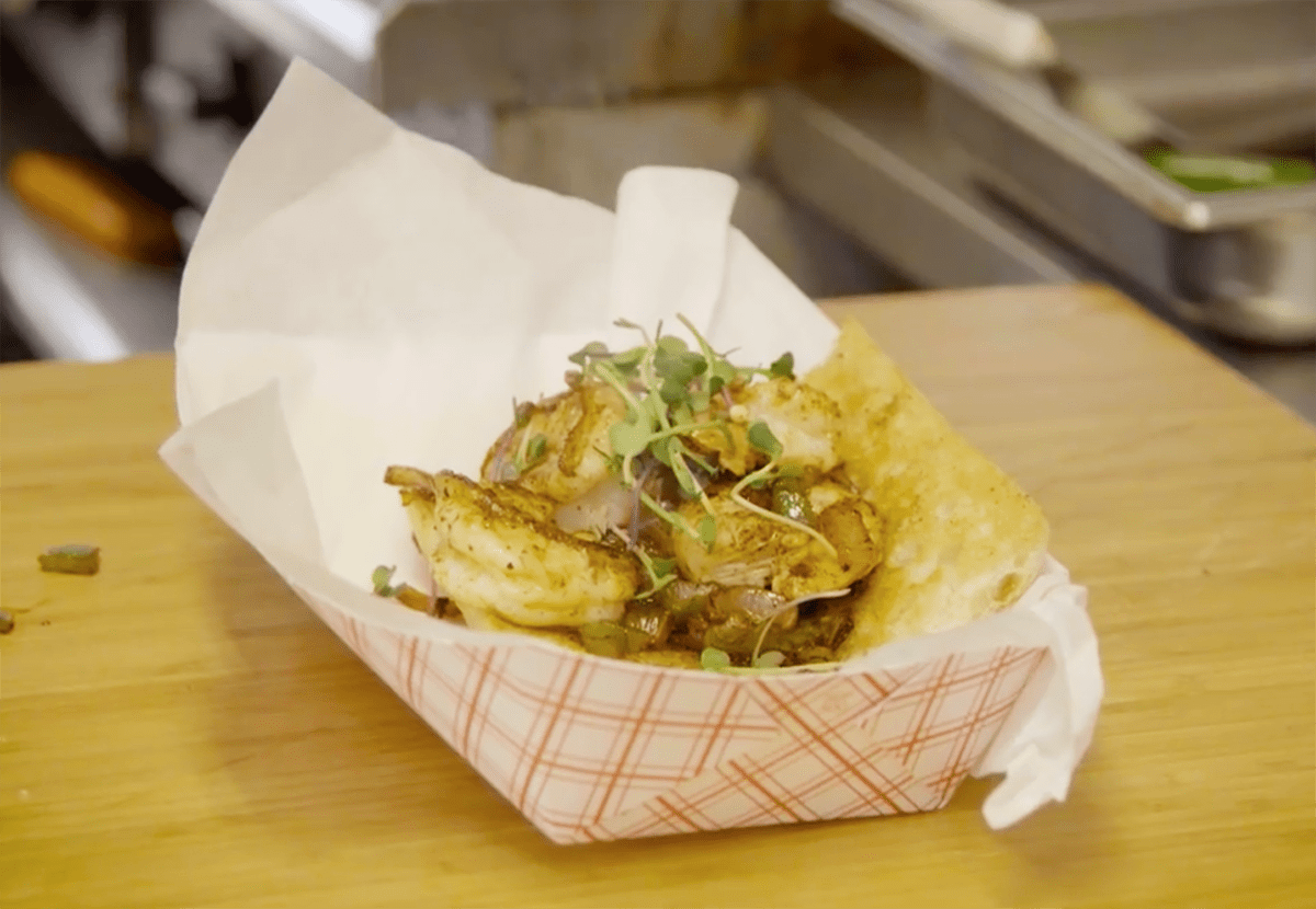 Chef Ace Champion takes us inside the Skaliwags Food Truck in Algoma, Wisconsin, with owner Chef Chris Wiltfang, where he shows us how to make an authentic Grilled Shrimp Po'Boy sandwich.