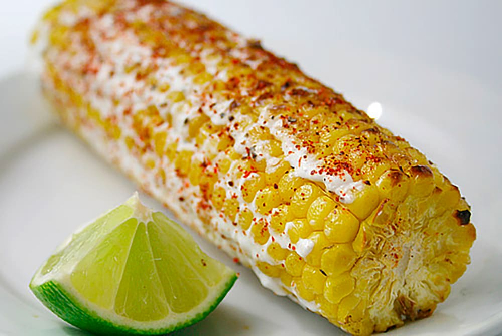 From celebrity caterer Andrea Correale, Founder and President of Elegant Affairs, this tailgate favorite, Cotija Mexican Corn.� Lightly charred corn, rolled in melted butter, covered with mayonnaise and topped with cotija cheese and lime wedges.�
