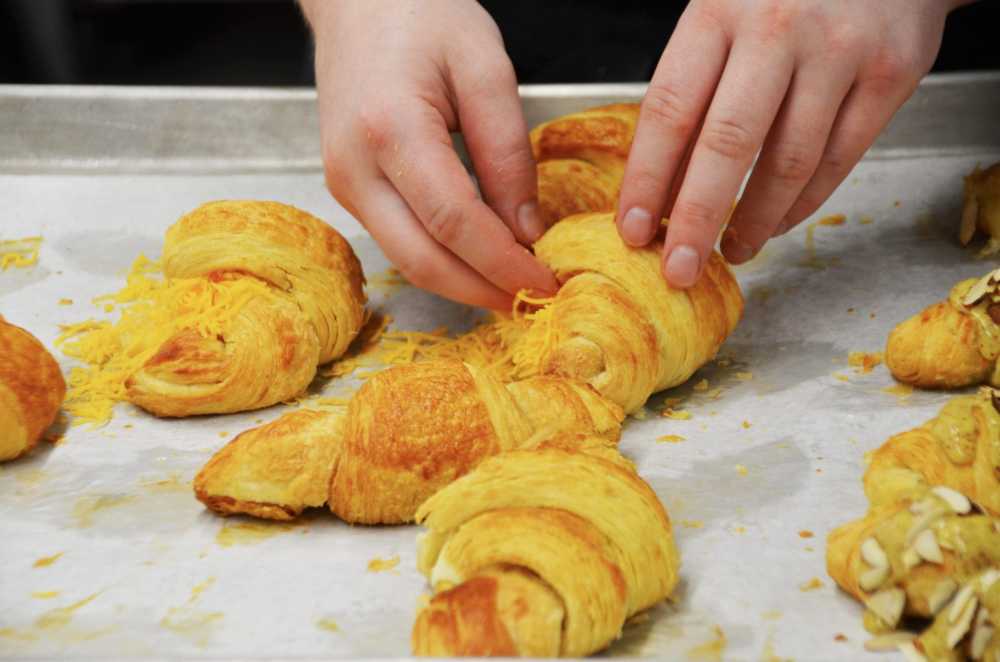 A student finishes a pastry for class at Brightwater, A Center for the Study of Food.