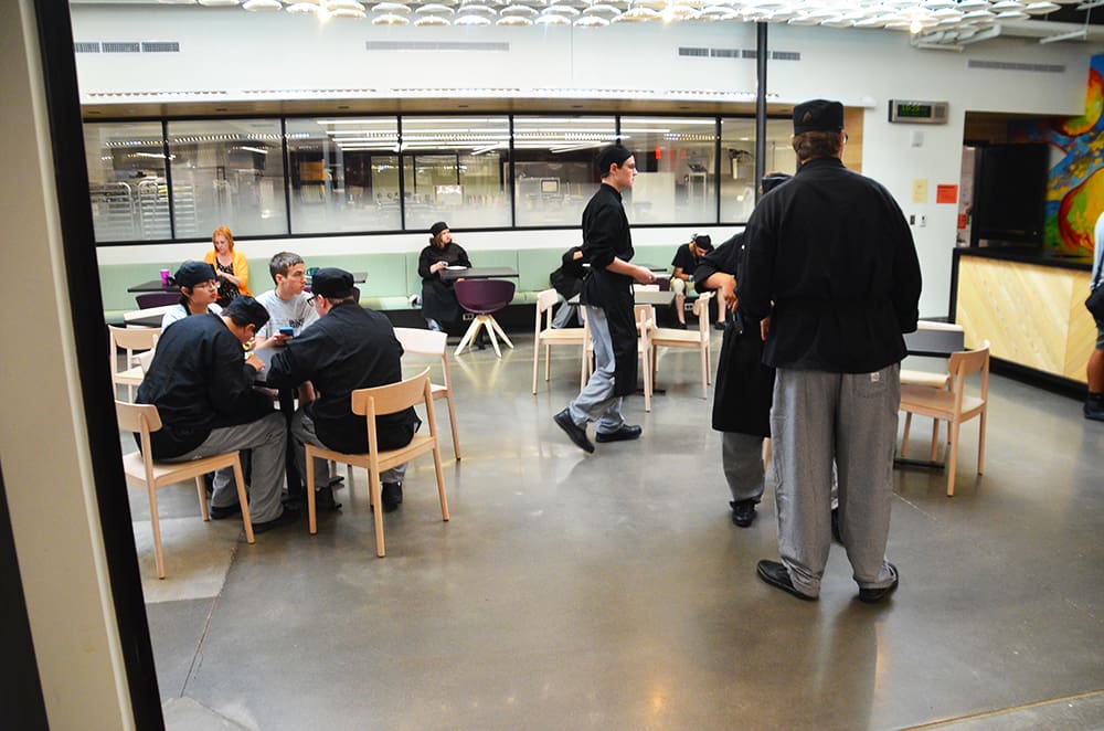 The main hall of Brightwater is surrounded on both sides by open classrooms for the public to watch training and hands-on cooking sessions at any time during school hours.