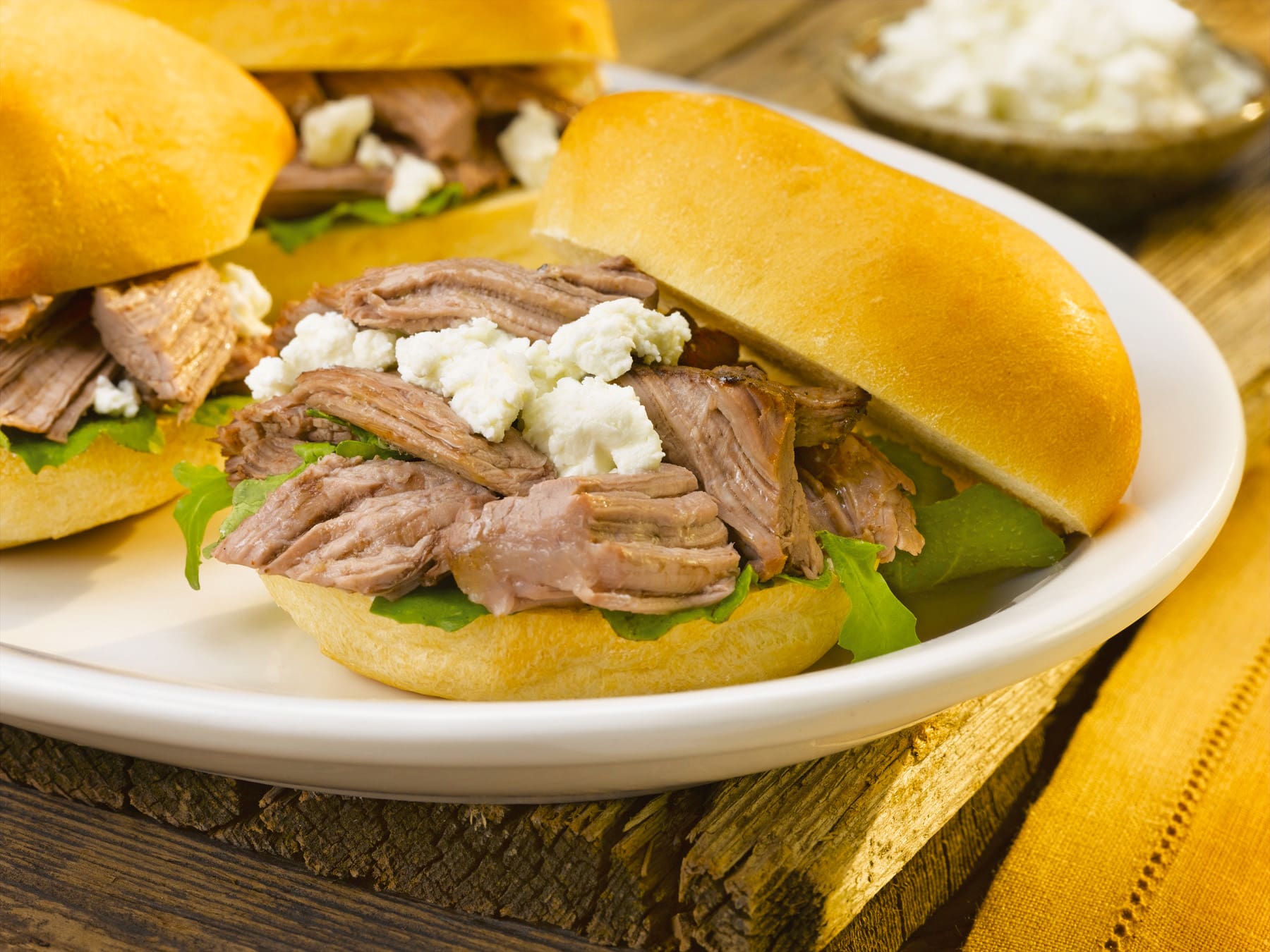 These Braised Lamb and Goat Cheese Sliders are perfect for get togethers with family and friends to watch sports, binge-watch movies and television or game night. They're also perfect for tailgating!