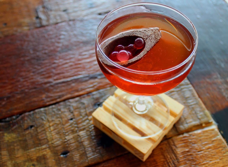 Add all ingredients to stirring vessel, then fill with ice. Stir with bar spoon until chilled. Strain into cocktail glass and add garnish.