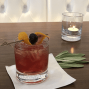 In a separate glass, muddle the agave, orange bitters, angostura, and cherry. Add tequila and ice, then stir. Strain over fresh ice into a rocks glass. Garnish with orange peel.