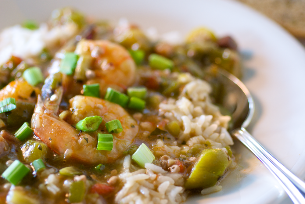 Hearty slow-simmered traditional gumbo served ladled over steamed white rice. Traditionally made with smoked ham, jumbo shrimp, okra, and just a hint of Cajun seasoning for that spicy kick.