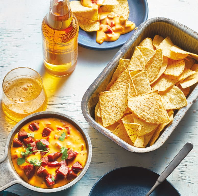 Spicy cheese dip made with sausage, perfect for dipping chips. The recipe comes from Martina McBride's latest cookbook, Martina's Kitchen Mix.