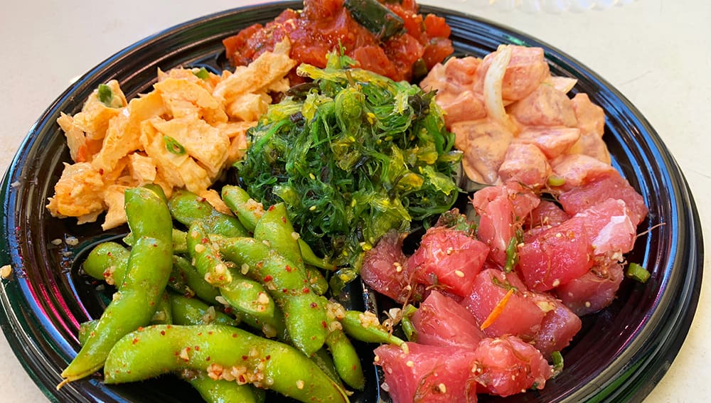 The Pono Market has become a popular stop for traditional Hawaiian take out, including for poke, a native Hawaiian dish of cubed raw fish. We sampled both the sesame ahi and the spicy ahi, the Market’s top sellers.