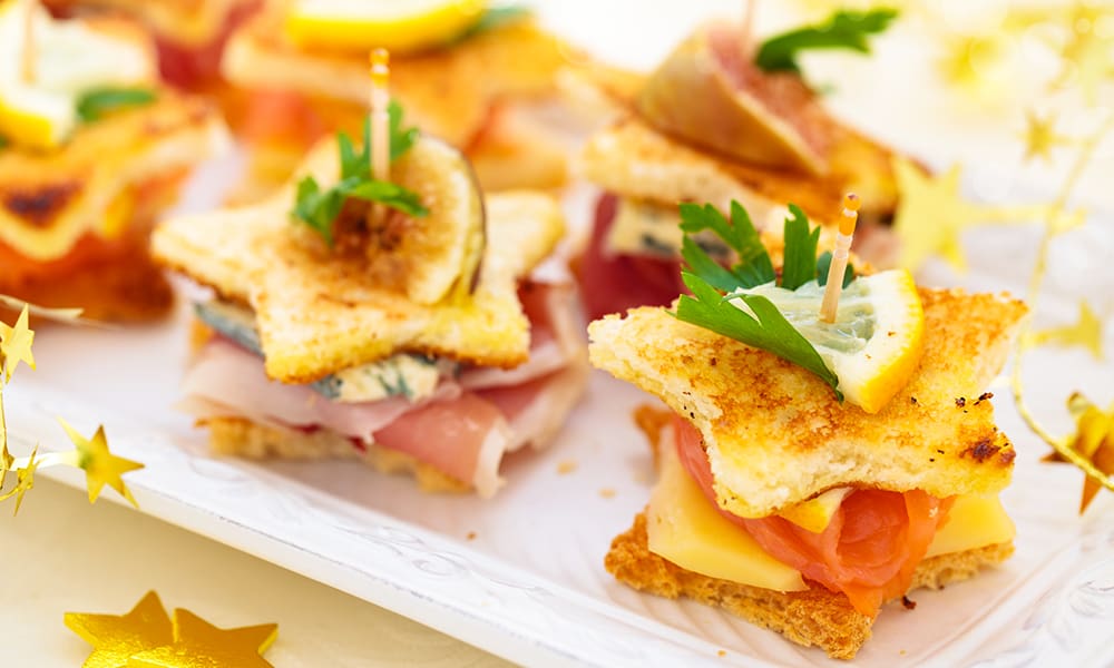 Hooray for Hollywood! You'll be the star of your Oscar� watch party with these Star-Shaped Mini Club Canap�s crafted by caterer-to-the-stars Andrea Correale!