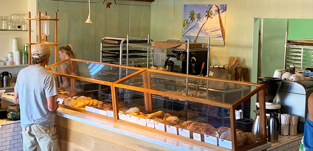 There is a bakery in Hanapepe that would surprise you with its menu. Sure, they focus on breads and pastries. But it’s what they do with those breads and croissants that makes this place memorable.