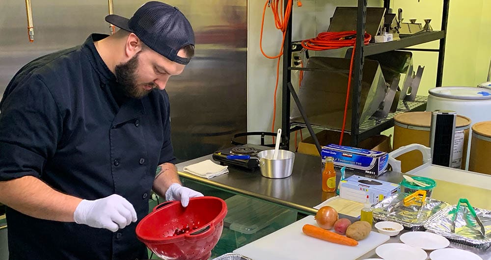 Laura took us back into the production area, where we met Chef Thomas. He offered a demonstration of how they use their salts, telling us, “Instead of saying our salt will change your life we can actually show you!” Here, folks, is the benefit of a tour. We sat comfortably and watched as item after item was treated to a salt of some flavor or another, and then got to eat good portions of flavorful potatoes, roasted corn, and cranberries, with recipes included.