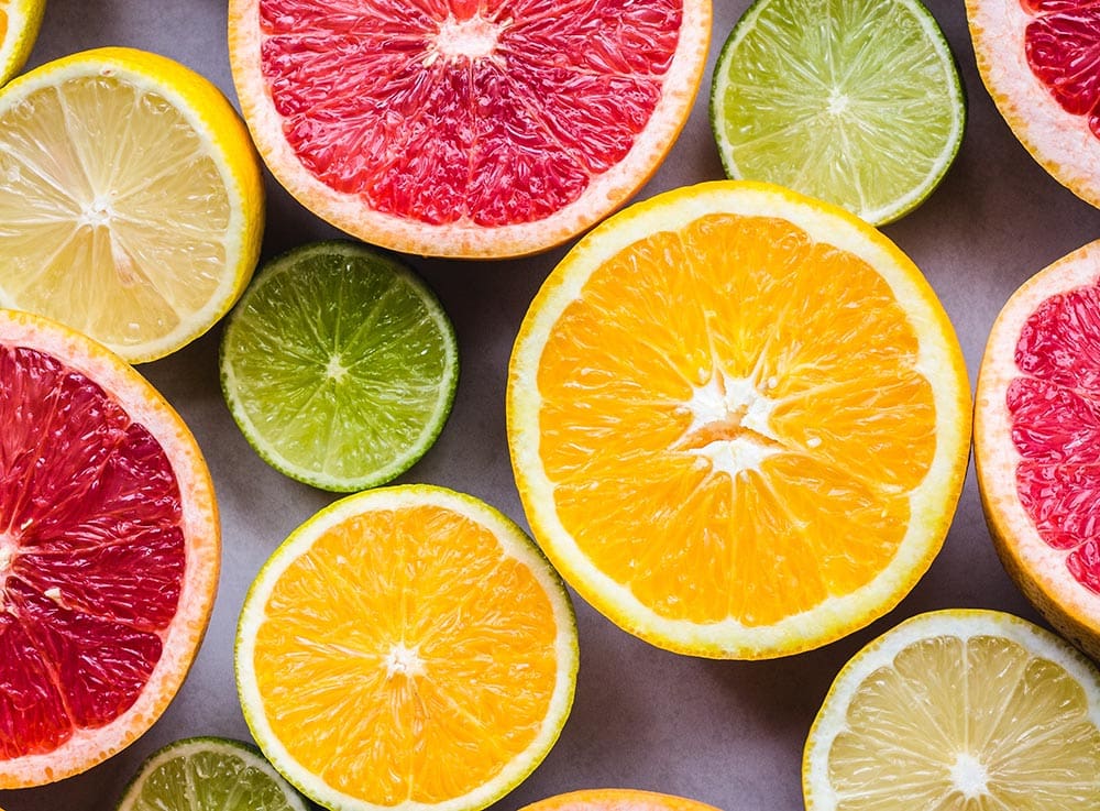 An assortment of fresh, sliced citrus, one of the superfoods featured in the Diabetes Superfoods Cookbook.
